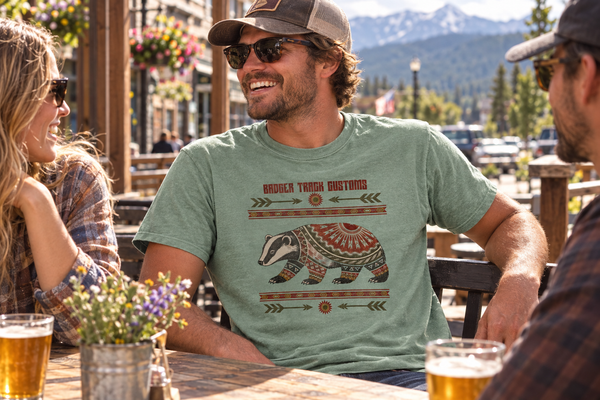 Badger graphic tee at an outdoor café