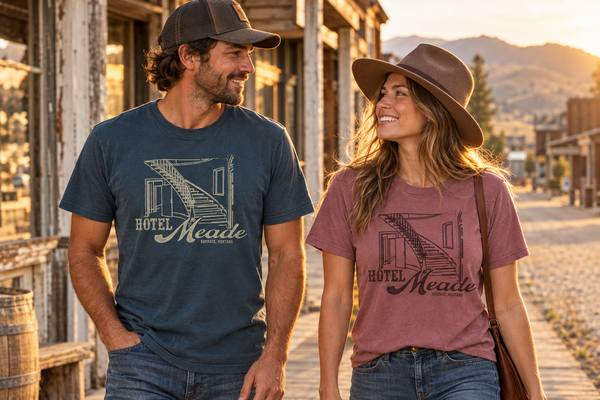 Navy and Mauve Hotel Meade tees on a historic street